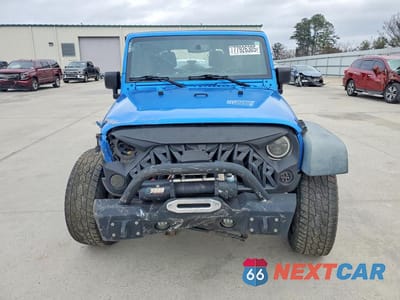 Piąte zdjęcie samochodu w środku: 2015 JEEP WRANGLER UNLIMITED SPORT VIN:1C4BJWDG2FL648785 - miniatura