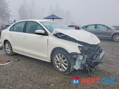 Czwarte zdjęcie samochodu z boku: 2012 VOLKSWAGEN JETTA SE VIN:3VWDP7AJ6CM314859 - miniatura