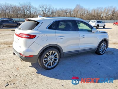 Trzecie zdjęcie samochodu z tyłu: 2015 LINCOLN MKC VIN:5LMCJ1A96FUJ20943 - miniatura