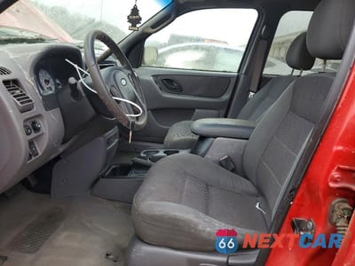 Zdjęcie 7 z 12 samochodu: 2002 FORD ESCAPE XLT VIN:1FMYU04182KD95610 - miniatura