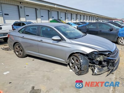 Czwarte zdjęcie samochodu z boku: 2023 VOLKSWAGEN JETTA SE VIN:3VWEM7BU0PM027190 - miniatura