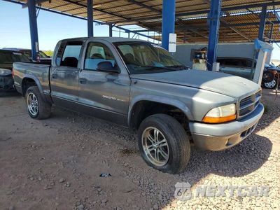 Czwarte zdjęcie samochodu z boku: 2002 DODGE DAKOTA QUAD SPORT VIN:1B7HG38N52S697219 - miniatura