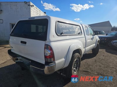 Czwarte zdjęcie samochodu z boku: 2011 TOYOTA TACOMA V6 VIN:5TFUU4EN3BX022330 - miniatura