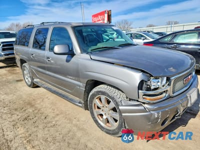 Czwarte zdjęcie samochodu z boku: 2006 GMC YUKON XL DENALI VIN:1GKFK66U36J166098 - miniatura