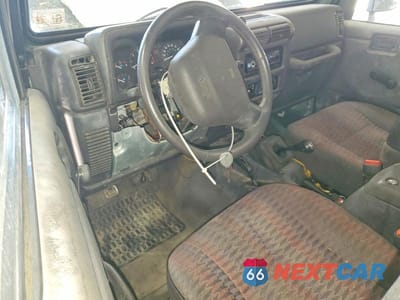 Zdjęcie 8 z 12 samochodu: 2000 JEEP WRANGLER / TJ SPORT VIN:1J4FA49S2YP710100 - miniatura