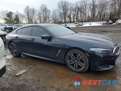 Czwarte zdjęcie samochodu z boku: 2023 BMW 840XI VIN:WBAGV4C0XPCK65257 - miniatura