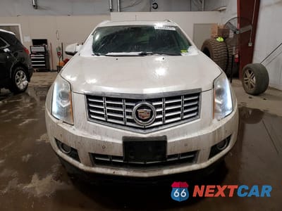 Piąte zdjęcie samochodu w środku: 2015 CADILLAC SRX PREMIUM COLLECTION VIN:3GYFNGE32FS548634 - miniatura