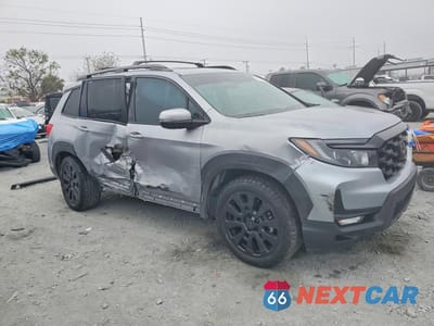 Czwarte zdjęcie samochodu z boku: 2022 HONDA PASSPORT EXL VIN:5FNYF7H56NB002385 - miniatura