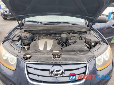Zdjęcie 12 z 13 samochodu: 2011 HYUNDAI SANTA FE GLS VIN:5XYZGDAG5BG083489 - miniatura