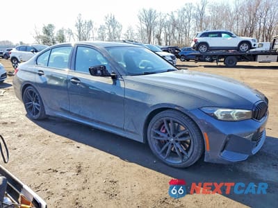 Czwarte zdjęcie samochodu z boku: 2023 BMW 330XI VIN:3MW89FF0XP8D63423 - miniatura