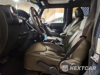 Zdjęcie 7 z 13 samochodu: 2017 JEEP WRANGLER UNLIMITED SAHARA VIN:1C4BJWEG4HL681644 - miniatura
