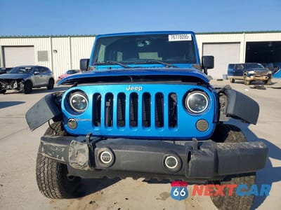 Piąte zdjęcie samochodu w środku: 2015 JEEP WRANGLER UNLIMITED SPORT VIN:1C4BJWDG2FL635115 - miniatura