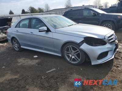 Czwarte zdjęcie samochodu z boku: 2016 MERCEDES-BENZ E 350 4MATIC VIN:WDDHF8JBXGB180706 - miniatura