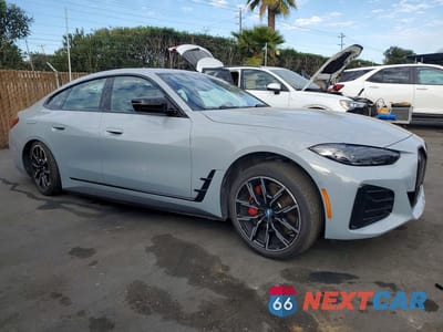 Czwarte zdjęcie samochodu z boku: 2024 BMW I4 EDRIVE 40 VIN:WBY73AW07RFS63260 - miniatura