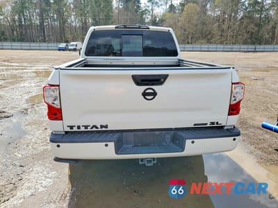 Zdjęcie 6 z 11 samochodu: 2019 NISSAN TITAN PLATINUM RESERVE VIN:1N6AA1E66KN532571 - miniatura