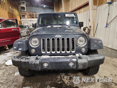 Piąte zdjęcie samochodu w środku: 2017 JEEP WRANGLER UNLIMITED SAHARA VIN:1C4BJWEG4HL681644 - miniatura