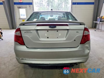 Zdjęcie 6 z 13 samochodu: 2010 FORD FUSION SE VIN:3FAHP0HA9AR111472 - miniatura