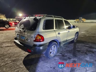 Trzecie zdjęcie samochodu z tyłu: 2004 HYUNDAI SANTA FE GLS VIN:KM8SC13E44U678838 - miniatura