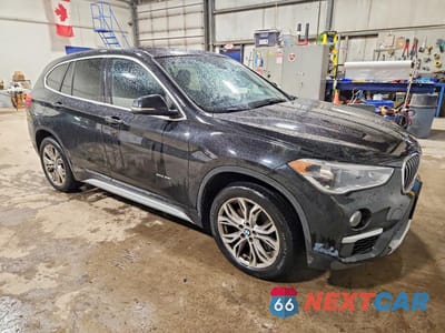 Czwarte zdjęcie samochodu z boku: 2018 BMW X1 XDRIVE28I VIN:WBXHT3C35J5L25476 - miniatura