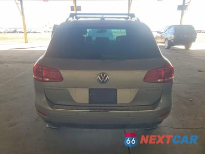 Zdjęcie 6 z 12 samochodu: 2011 VOLKSWAGEN TOUAREG HYBRID VIN:WVGFG9BP5BD001253 - miniatura