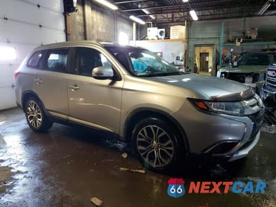 Czwarte zdjęcie samochodu z boku: 2016 MITSUBISHI OUTLANDER ES VIN:JA4AZ2A30GZ607319 - miniatura
