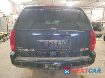 Zdjęcie 6 z 12 samochodu: 2007 GMC YUKON XL K1500 VIN:1GKFK163X7J257686 - miniatura