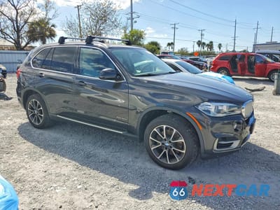 Czwarte zdjęcie samochodu z boku: 2016 BMW X5 XDR40E VIN:5UXKT0C50G0S75187 - miniatura
