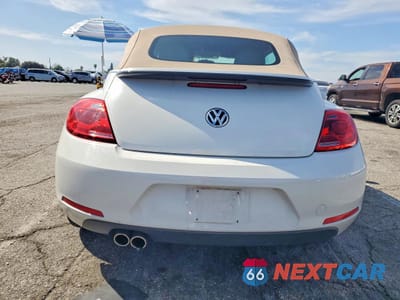 Zdjęcie 6 z 12 samochodu: 2014 VOLKSWAGEN BEETLE VIN:3VW5X7AT5EM804394 - miniatura