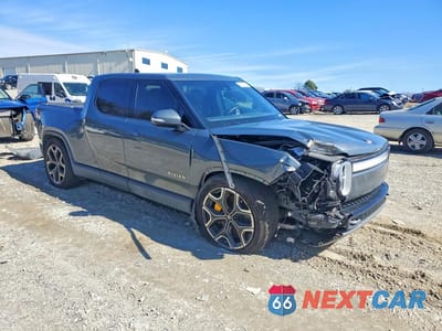 Czwarte zdjęcie samochodu z boku: 2022 RIVIAN R1T LAUNCH EDITION VIN:7FCTGAAL2NN011562 - miniatura