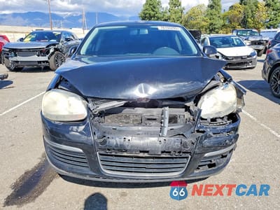 Piąte zdjęcie samochodu w środku: 2010 VOLKSWAGEN JETTA LIMITED VIN:3VWAZ7AJ6AM116261 - miniatura