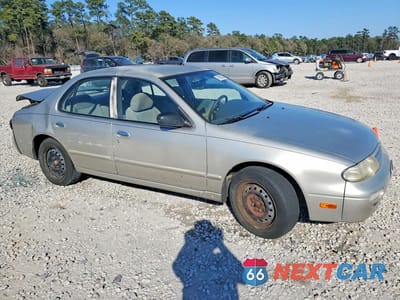 Czwarte zdjęcie samochodu z boku: 1997 NISSAN ALTIMA XE VIN:1N4BU31D4VC252684 - miniatura