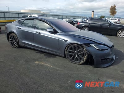 Czwarte zdjęcie samochodu z boku: 2023 TESLA MODEL S VIN:5YJSA1E60PF499354 - miniatura