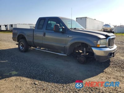 Czwarte zdjęcie samochodu z boku: 2003 FORD F350 SRW SUPER DUTY VIN:1FTSX31S43EB22308 - miniatura