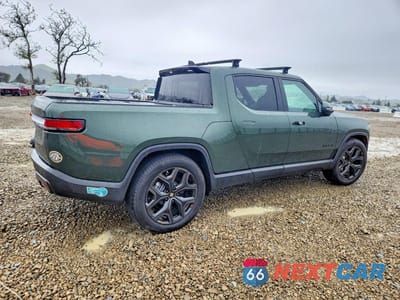 Trzecie zdjęcie samochodu z tyłu: 2025 RIVIAN R1T ADVENTURE VIN:7FCTGBAA4SN041744 - miniatura