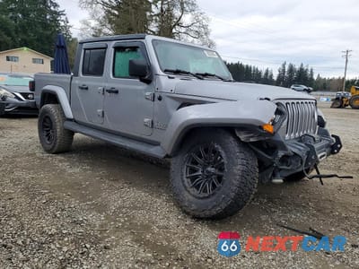 Czwarte zdjęcie samochodu z boku: 2020 JEEP GLADIATOR OVERLAND VIN:1C6HJTFG1LL129431 - miniatura