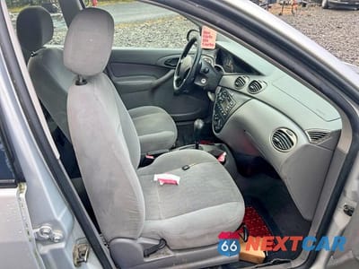 Zdjęcie 7 z 13 samochodu: 2001 FORD FOCUS LX VIN:1FAFP33P71W151227 - miniatura