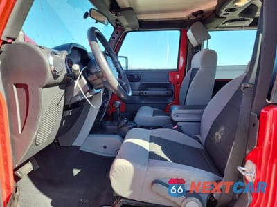 Zdjęcie 7 z 12 samochodu: 2010 JEEP WRANGLER SPORT VIN:1J4AA2D1XAL139272 - miniatura