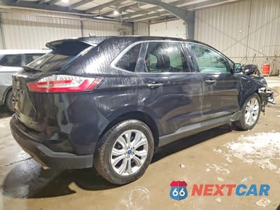 Trzecie zdjęcie samochodu z tyłu: 2022 FORD EDGE TITANIUM VIN:2FMPK4K90NBA95012 - miniatura