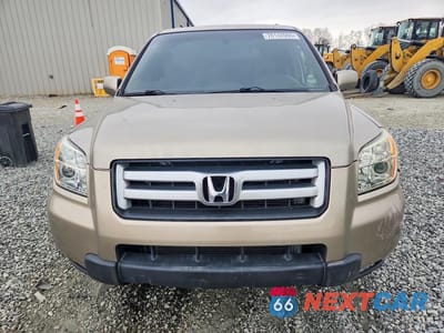 Piąte zdjęcie samochodu w środku: 2006 HONDA PILOT EX VIN:2HKYF18556H508032 - miniatura