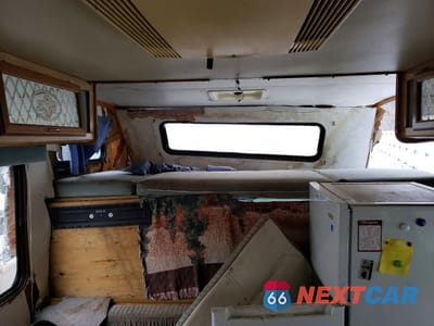 Piąte zdjęcie samochodu w środku: 1991 FORD ECONOLINE E350 CUTAWAY VAN VIN:1FDKE30G2MHA88495 - miniatura