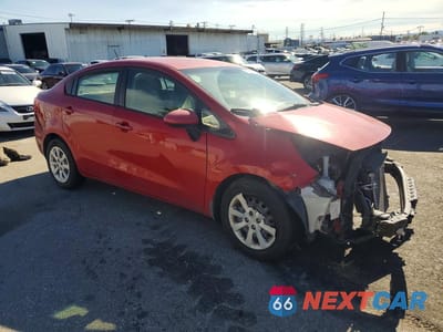 Czwarte zdjęcie samochodu z boku: 2013 KIA RIO LX VIN:KNADM4A3XD6302286 - miniatura
