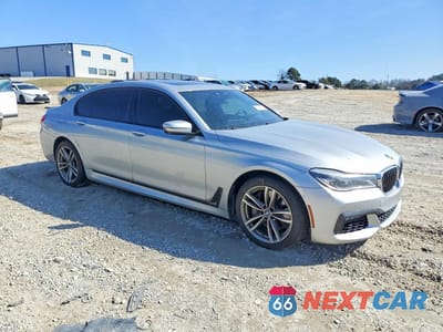 Czwarte zdjęcie samochodu z boku: 2016 BMW 750 XI VIN:WBA7F2C5XGG418581 - miniatura