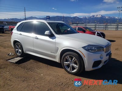 Czwarte zdjęcie samochodu z boku: 2018 BMW X5 XDR40E VIN:5UXKT0C52J0V99524 - miniatura