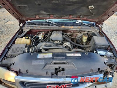 Zdjęcie 11 z 11 samochodu: 1999 GMC SIERRA VIN:1GTEC14V8XZ531753 - miniatura