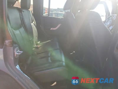 Zdjęcie 10 z 11 samochodu: 2014 JEEP WRANGLER UNLIMITED RUBICON VIN:1C4HJWFG0EL134861 - miniatura