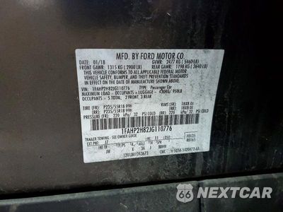 Zdjęcie 12 z 12 samochodu: 2018 FORD TAURUS SEL VIN:1FAHP2H82JG110776 - miniatura