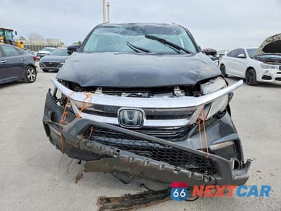 Piąte zdjęcie samochodu w środku: 2020 HONDA PILOT TOURING VIN:5FNYF5H63LB000278 - miniatura