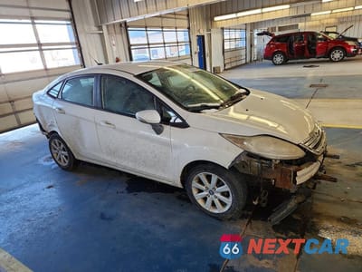 Czwarte zdjęcie samochodu z boku: 2013 FORD FIESTA SE VIN:3FADP4BJ2DM173280 - miniatura