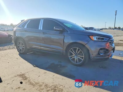 Czwarte zdjęcie samochodu z boku: 2019 FORD EDGE TITANIUM VIN:2FMPK4K91KBB20589 - miniatura