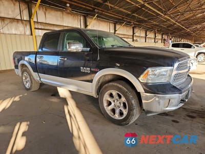 Czwarte zdjęcie samochodu z boku: 2015 RAM 1500 LARAMIE VIN:1C6RR6NM0FS581449 - miniatura